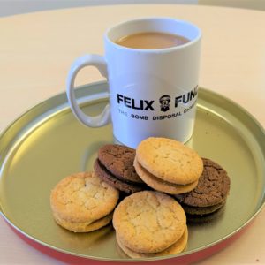 Felix Fund mug of coffee and biscuits