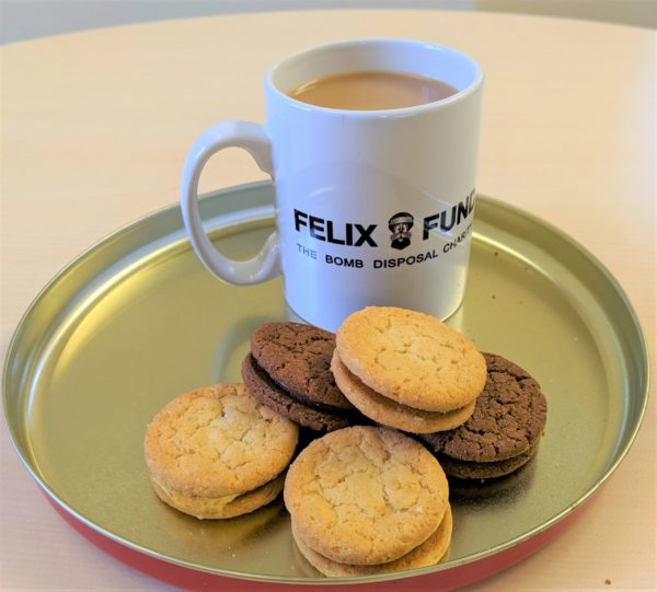 Felix Fund mug of coffee and biscuits